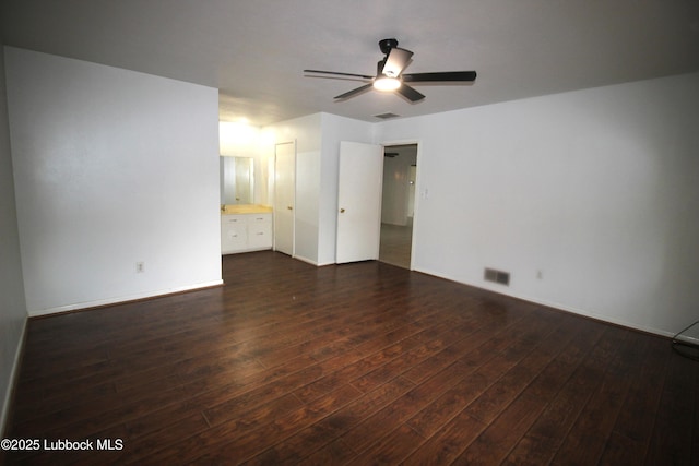 3707 38th St, Lubbock, TX 79413 - empty room featuring dark wood-style floors and a ceiling fan