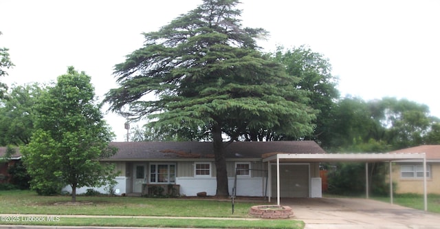 3707 38th St, Lubbock, TX 79413 - single story home featuring an attached carport, driveway, and a front lawn