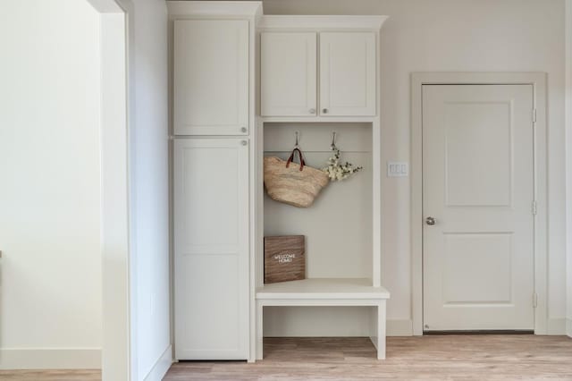 mudroom with light wood-type flooring