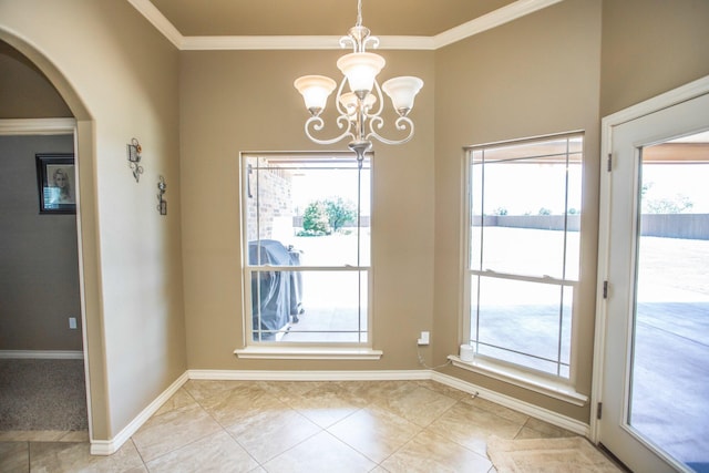 unfurnished dining area featuring light tile patterned floors, an inviting chandelier, arched walkways, ornamental molding, and baseboards