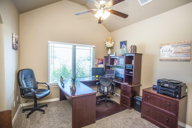 office featuring a healthy amount of sunlight, carpet, and lofted ceiling
