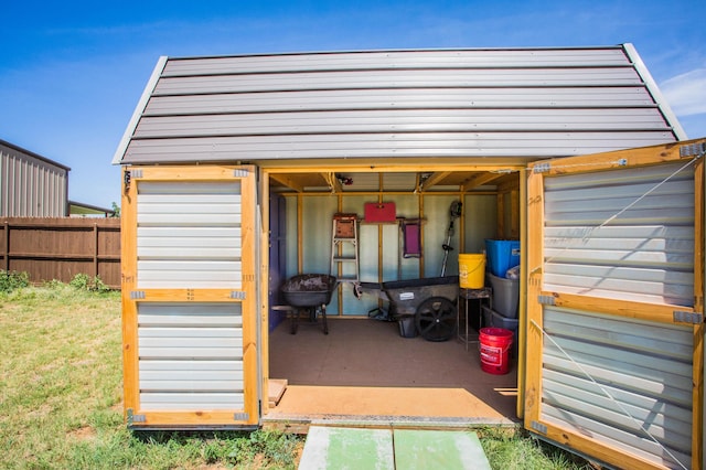 garage with fence