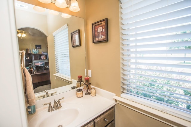 bathroom with visible vents, plenty of natural light, and vanity