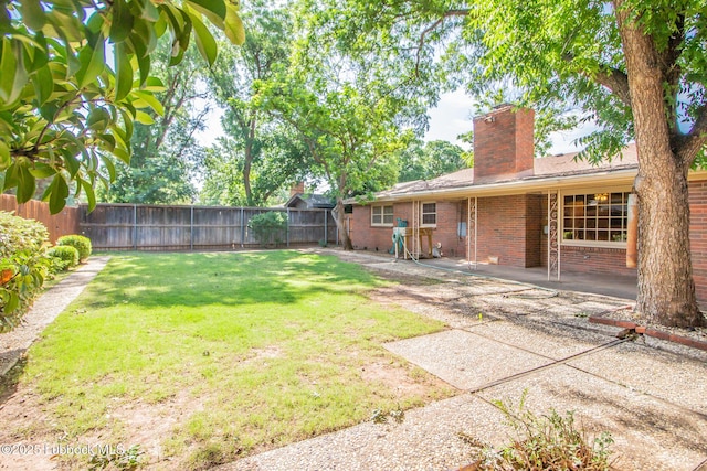 3404 59th St, Lubbock, TX 79413 - view of yard with a patio