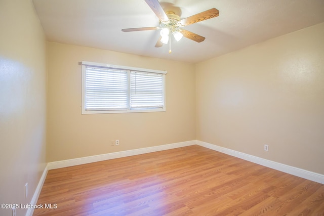 3404 59th St, Lubbock, TX 79413 - empty room featuring light wood-style flooring, a ceiling fan, and baseboards