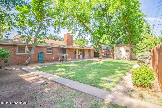3404 59th St, Lubbock, TX 79413 - view of yard with a patio area