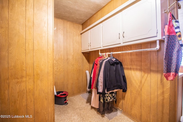 3404 59th St, Lubbock, TX 79413 - walk in closet featuring carpet floors