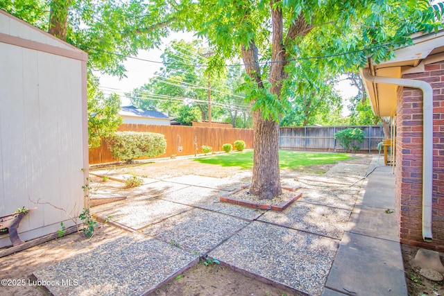 3404 59th St, Lubbock, TX 79413 - fenced backyard featuring a patio
