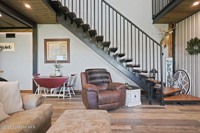 743 Co Rd, M, Tahoka, TX 79373 - living area featuring wood finished floors, stairway, and recessed lighting