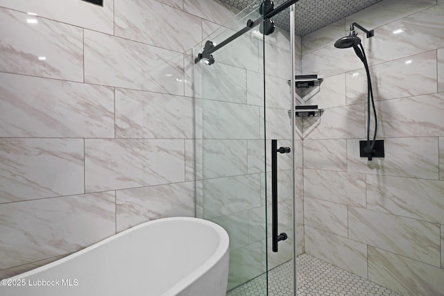 743 Co Rd, M, Tahoka, TX 79373 - bathroom featuring a freestanding bath and a stall shower