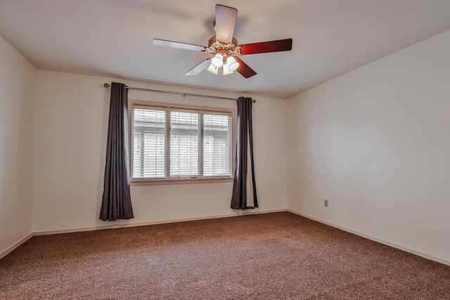 empty room with carpet and ceiling fan