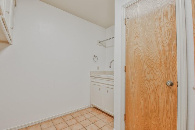 bathroom featuring vanity and tile patterned flooring