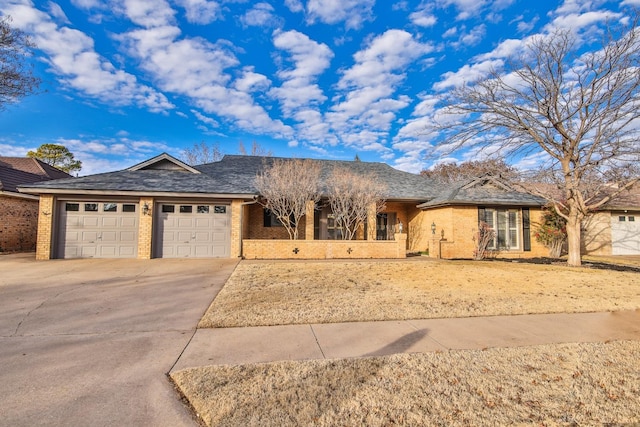 ranch-style house featuring a garage