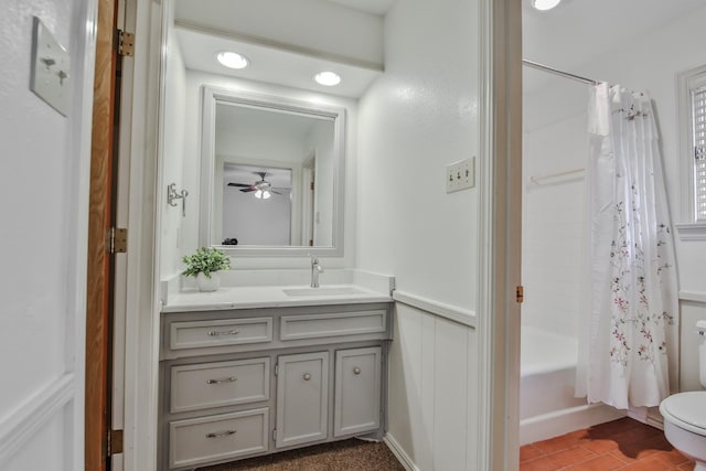 full bathroom featuring shower / tub combo, vanity, and toilet