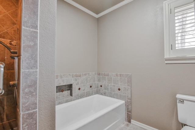 bathroom with a tub to relax in, crown molding, and toilet