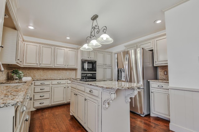 kitchen featuring pendant lighting, dark hardwood / wood-style flooring, black appliances, and a kitchen island