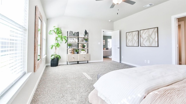 bedroom featuring lofted ceiling, carpet floors, and ceiling fan