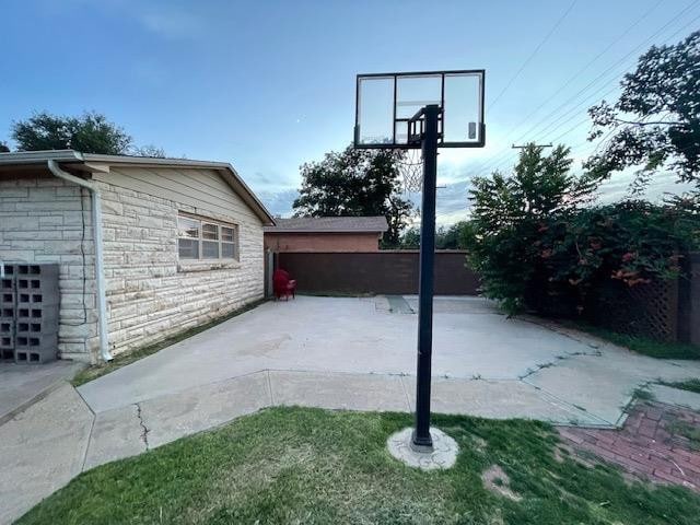 exterior space with basketball court