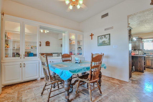 dining area featuring ceiling fan