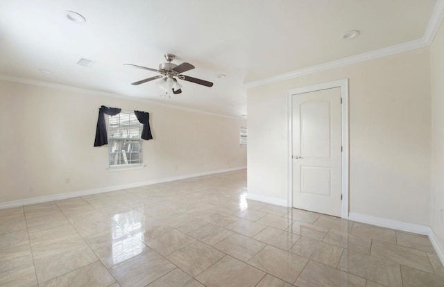 spare room featuring crown molding and ceiling fan