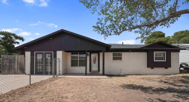 view of front of home with a patio area