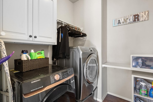 laundry area featuring cabinets and washer and dryer