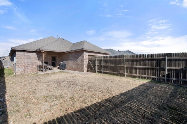 back of house featuring a patio