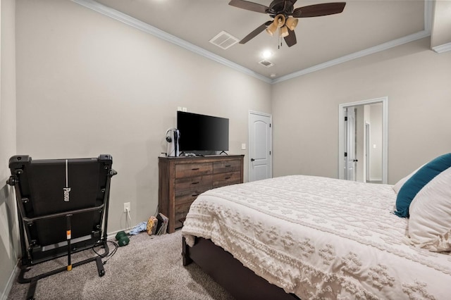 bedroom with crown molding, carpet floors, and ceiling fan