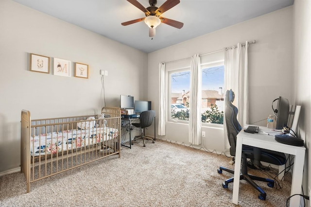 interior space with ceiling fan