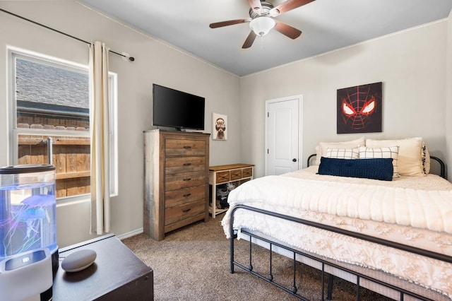 carpeted bedroom with ceiling fan and multiple windows