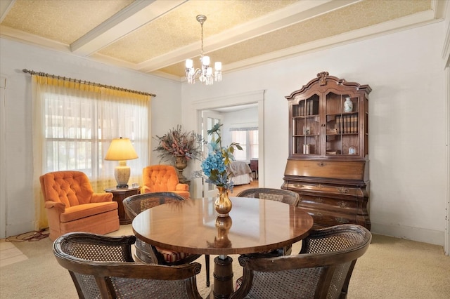 carpeted dining area featuring beamed ceiling, baseboards, and a chandelier