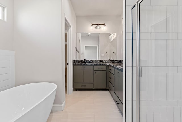 bathroom with vanity, tile patterned flooring, and independent shower and bath