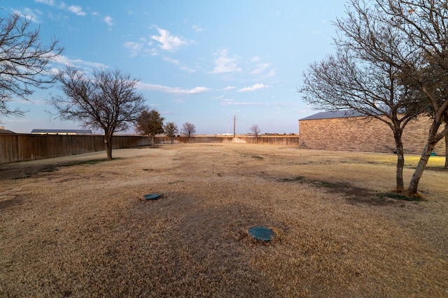 view of yard with fence