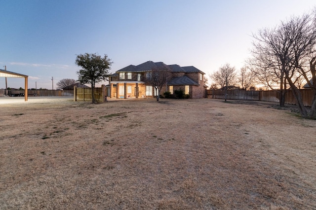 exterior space with a fenced backyard