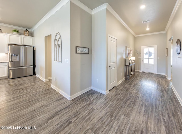 3301 Venita Ave, Lubbock, TX 79407 - entrance foyer featuring wood finished floors and crown molding