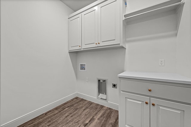 laundry area with dark wood-type flooring, cabinets, hookup for an electric dryer, and hookup for a washing machine