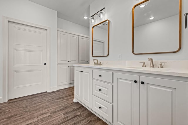 bathroom featuring vanity and hardwood / wood-style floors