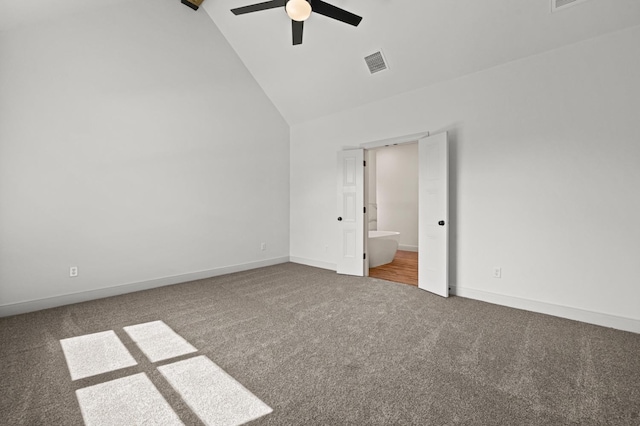 unfurnished bedroom featuring ceiling fan, carpet flooring, and high vaulted ceiling