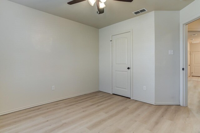 unfurnished bedroom featuring light hardwood / wood-style floors and ceiling fan