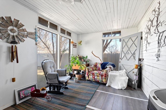 sunroom featuring wood ceiling