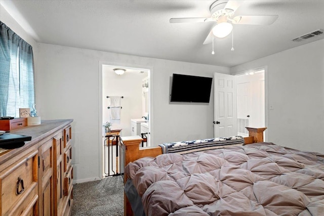 bedroom featuring ceiling fan, carpet floors, and ensuite bath