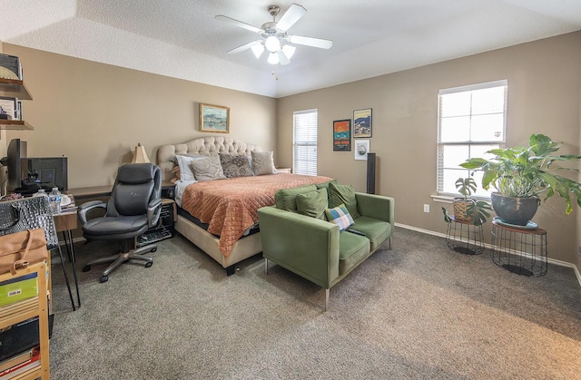 6901 9th St, Lubbock, TX 79416 - bedroom with carpet flooring, a desk, baseboards, and ceiling fan
