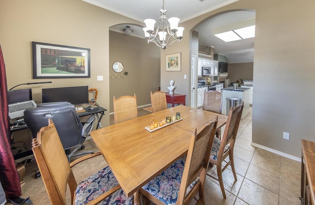 6901 9th St, Lubbock, TX 79416 - dining space featuring arched walkways, ornamental molding, a chandelier, and baseboards