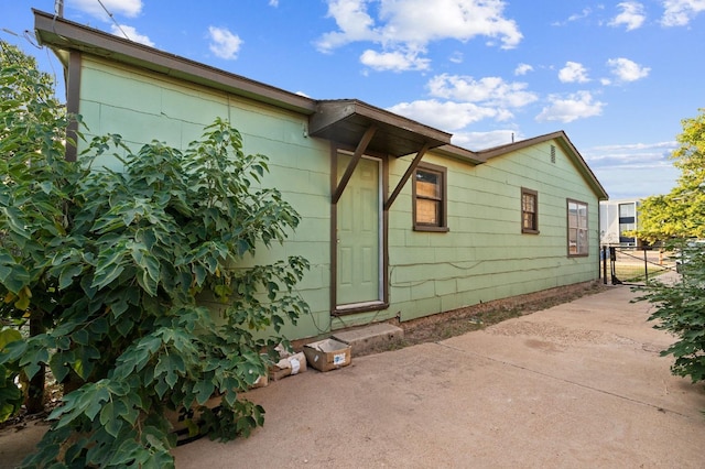 view of home's exterior with a patio area