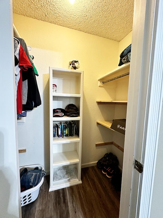 5712 70th Pl, Lubbock, TX 79424 - spacious closet featuring wood finished floors