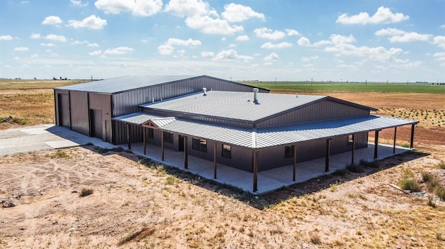 exterior space with a rural view