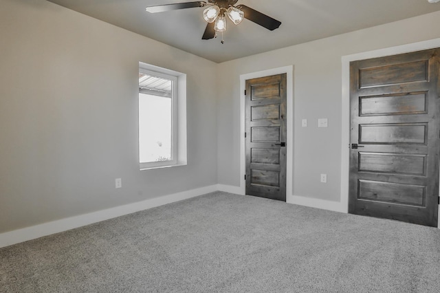 unfurnished bedroom with carpet floors and ceiling fan