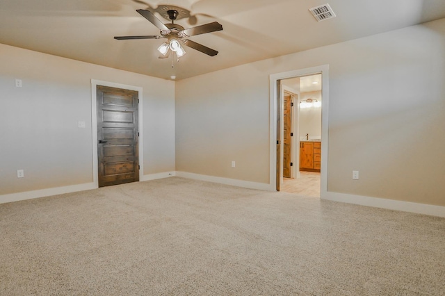 unfurnished room featuring ceiling fan