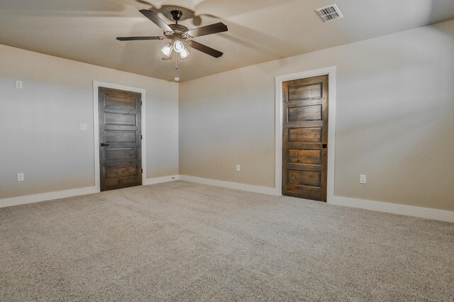 carpeted empty room with ceiling fan