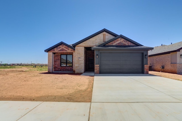 view of front of home with a garage